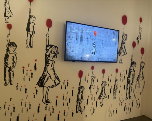 بانسكي في مدينة إدمونتون الكندية: بين الفن الأصلي والنسخ المطبوعة