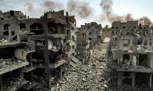 This picture taken on October 11, 2023 shows an aerial view of buildings destroyed by Israeli air strikes in the Jabalia camp for Palestinian refugees in Gaza City. Israel declared war on Hamas on October 8 following a shock land, air and sea assault by the Gaza-based Islamists. The death toll from the shock cross-border assault by Hamas militants rose to 1,200, making it the deadliest attack in the country's 75-year history, while Gaza officials reported more than 900 people killed as Israel pounded the territory with air strikes. (Photo by Yahya HASSOUNA / AFP)