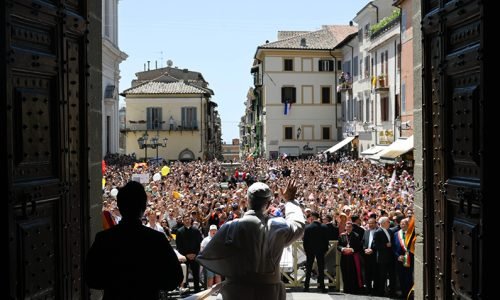 Pope Leo XIV greets visitors ahead of the Angelus prayer in Castel Gandolfo, Italy, July 20, 2025. (CNS photo/Vatican Media)