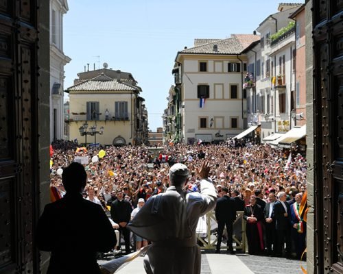 Pope Leo XIV greets visitors ahead of the Angelus prayer in Castel Gandolfo, Italy, July 20, 2025. (CNS photo/Vatican Media)